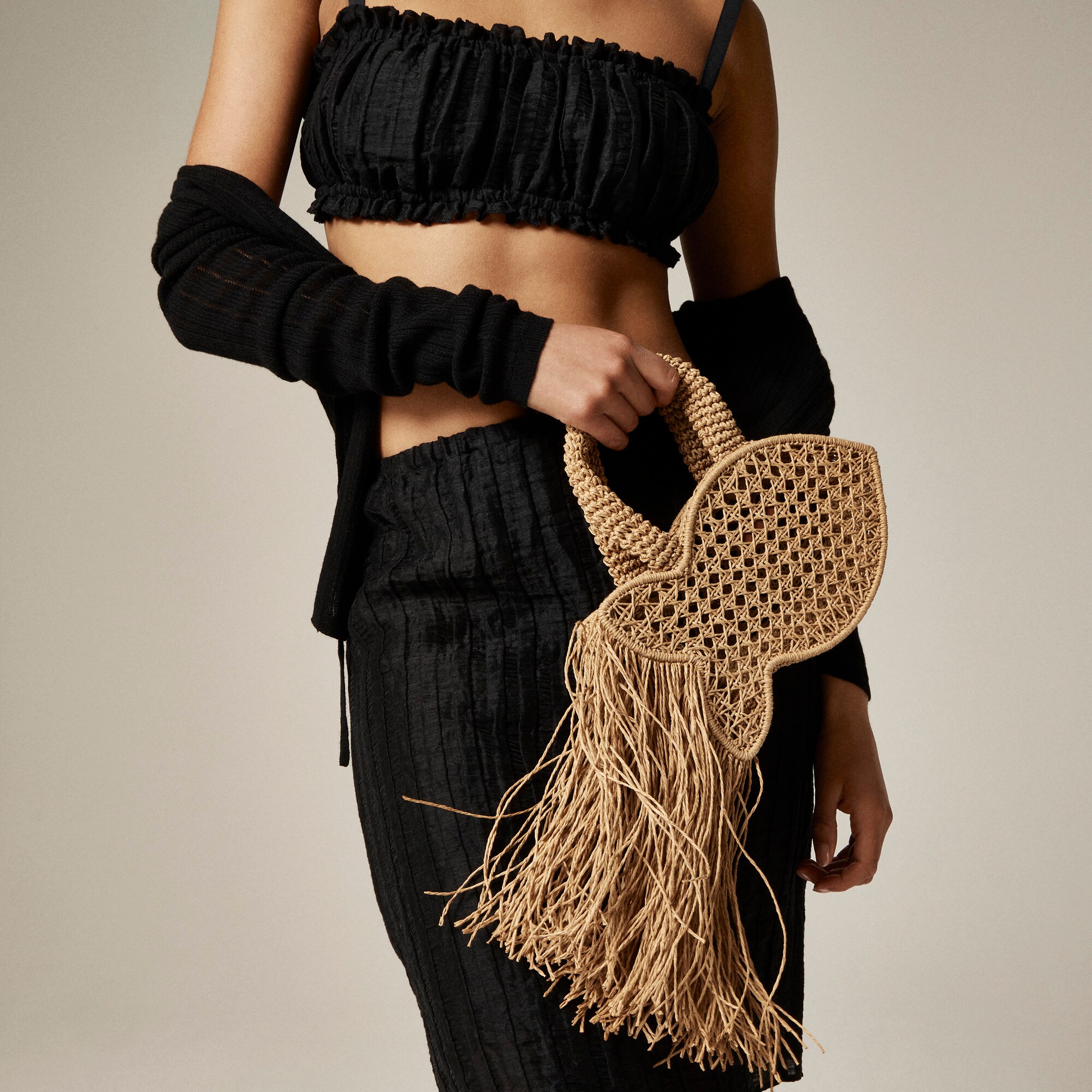 womens Handknotted raffia fish bag with straw fringe